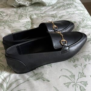 Elegant Black Loafers with Gold Accents